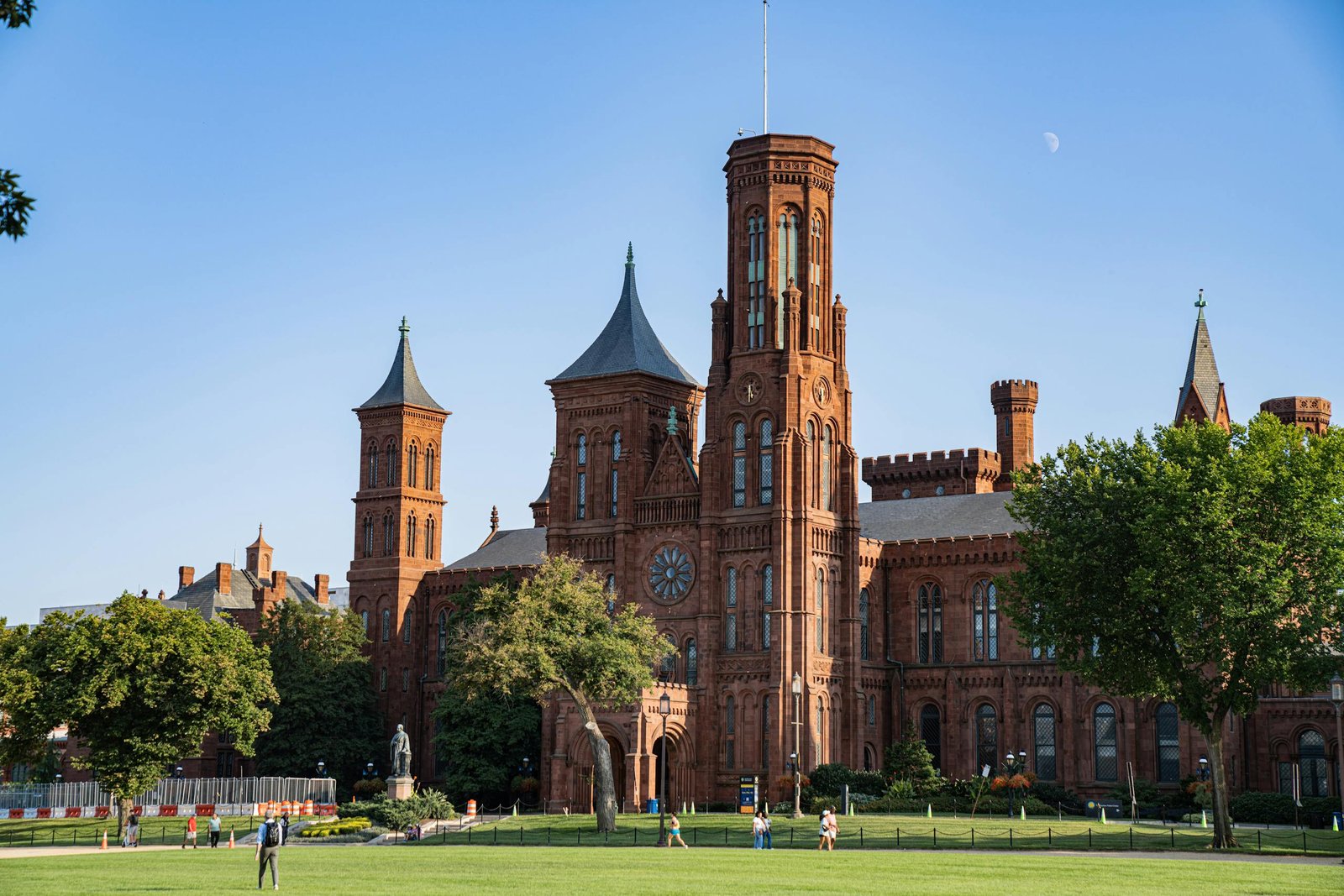 The iconic Smithsonian Institution Building, also known as The Castle, in Washington DC on a sunny day.